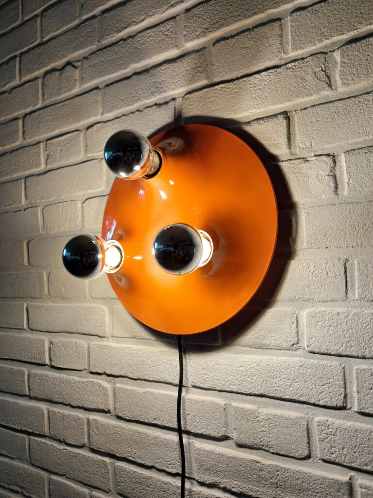 Triteti walllights Artemide Magistretti